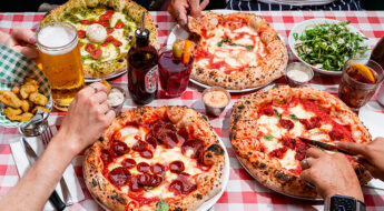 pizza pilgrims pizzas on a table brighton