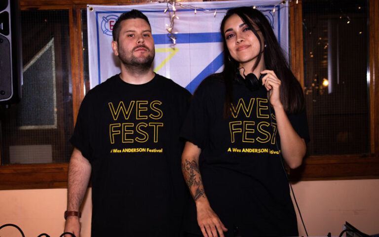 white wall cinema founder leila and henry wearing wes est t shirts