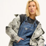 model wearing lucy and yak denim dungarees