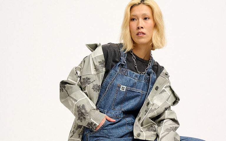 model wearing lucy and yak denim dungarees